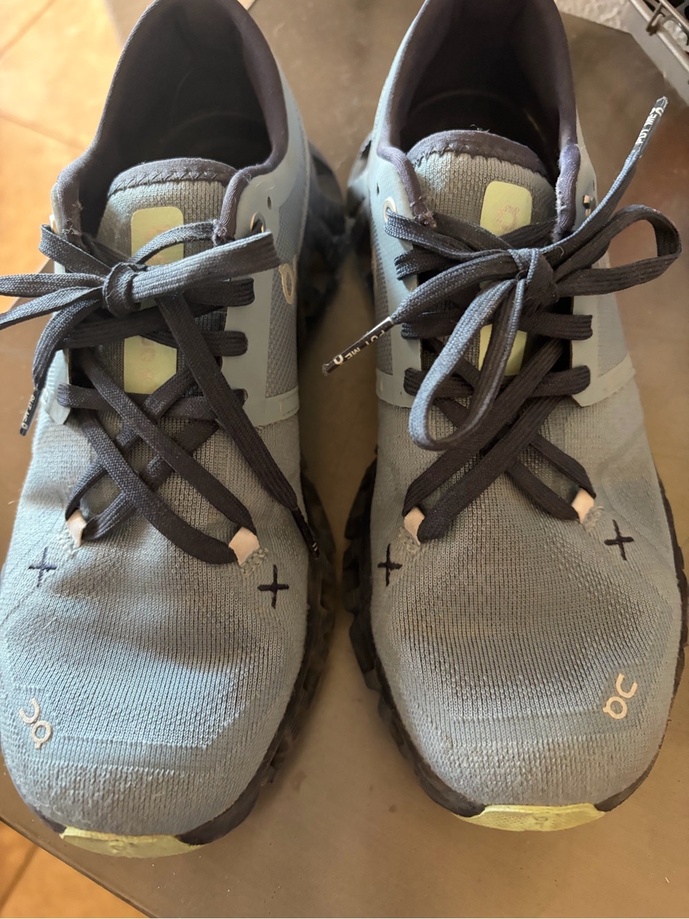 On Running Kids Sneakers in Gray and Black with Light Yellow Accents